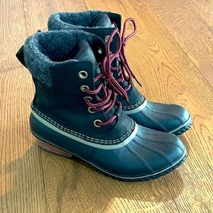 Black Sorel boots with red laces.  Worn once!  Very warm for cold rainy days!